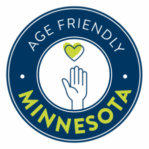 Age-Friendly Minnesota logo. A round logo with a hand and a heart