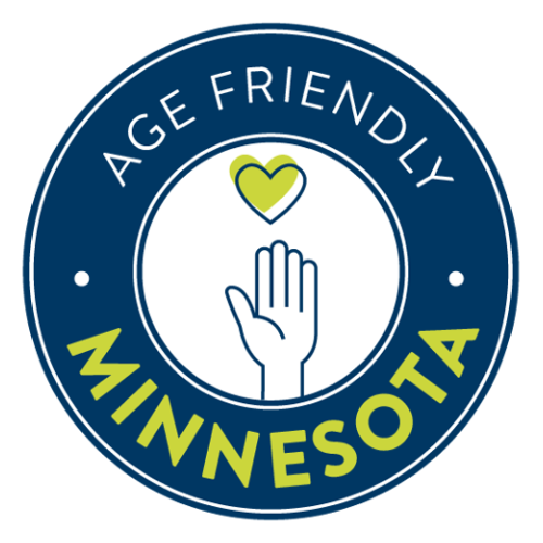 Age-Friendly Minnesota logo. A round logo with a hand and a heart